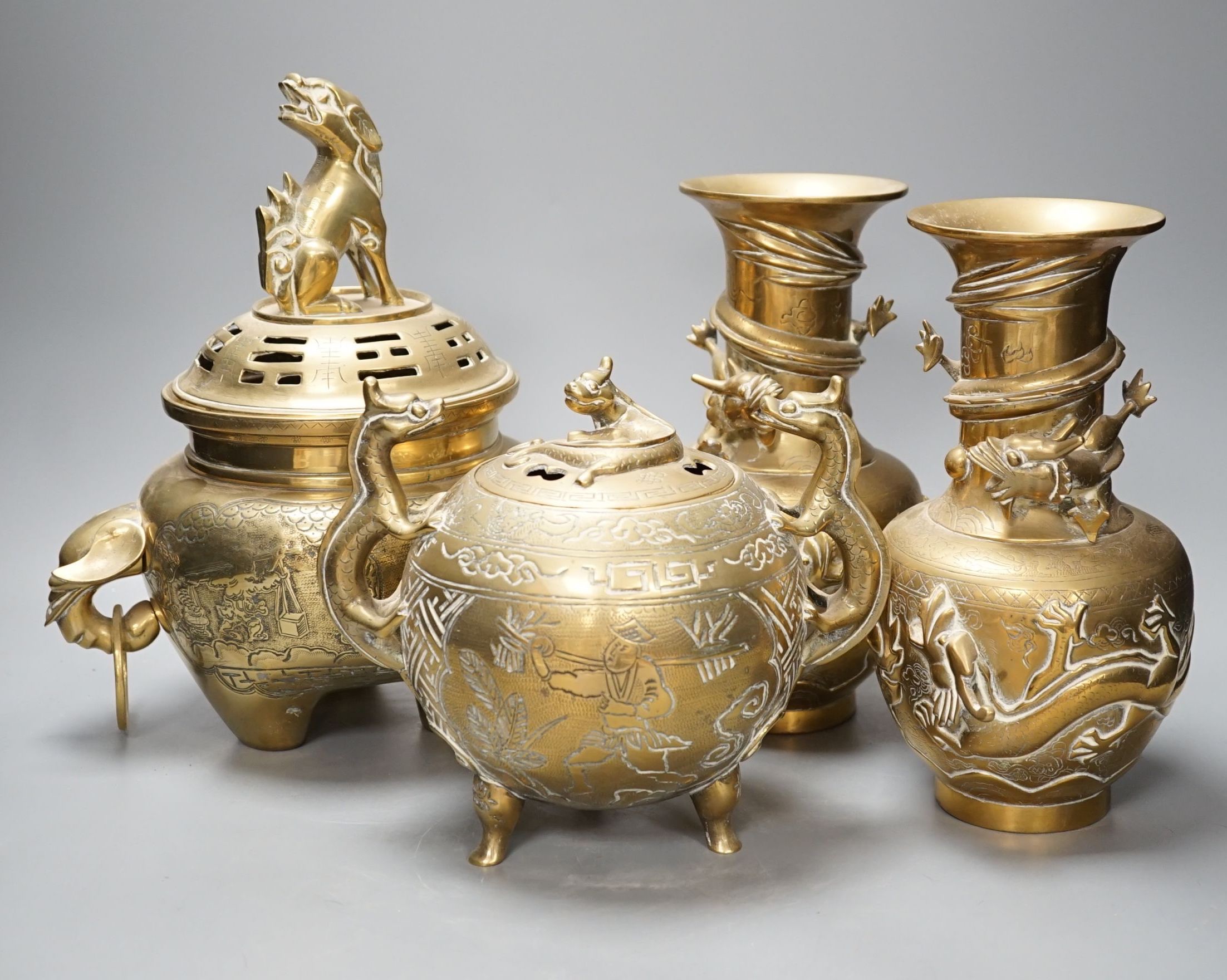 A pair of Chinese brass dragon vases, 26cm, together with two similar incense burners, tallest 30cm high